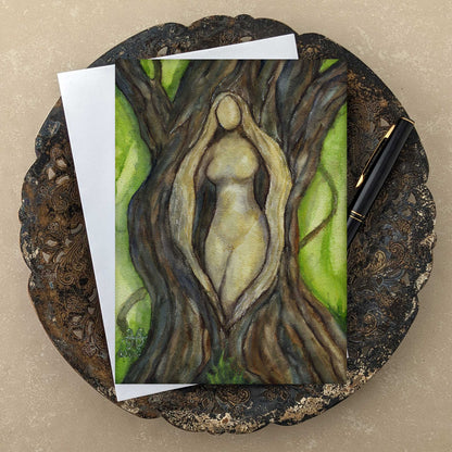 Tree Goddess Greeting Card in shades of brown and green with white envelope black pen on antique copper tray